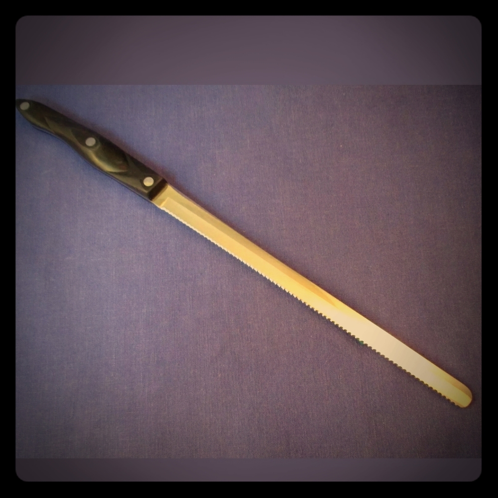 Really nice Cutco brand Serrated knife, was $200!